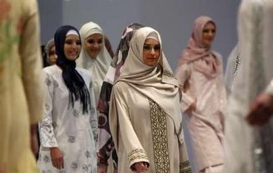 Turkish models present an Islamic creation during an Islamic Fashion Fair in Istanbul Something to coverup the hair on the legs and arms

