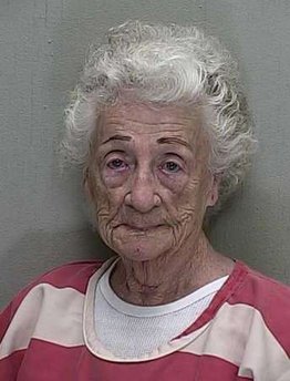 The booking mugshot of 92-year-old Helen Staudinger is seen in this handout released March 23, 2011. The central Florida woman fired a semi-automatic pistolfour times at her 53-year-old neighbor's house after he refused to kiss her, police said
