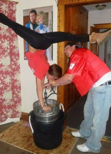 Cool. Cute girl doing a kegstand while doing a gymnastics move? Even better.
