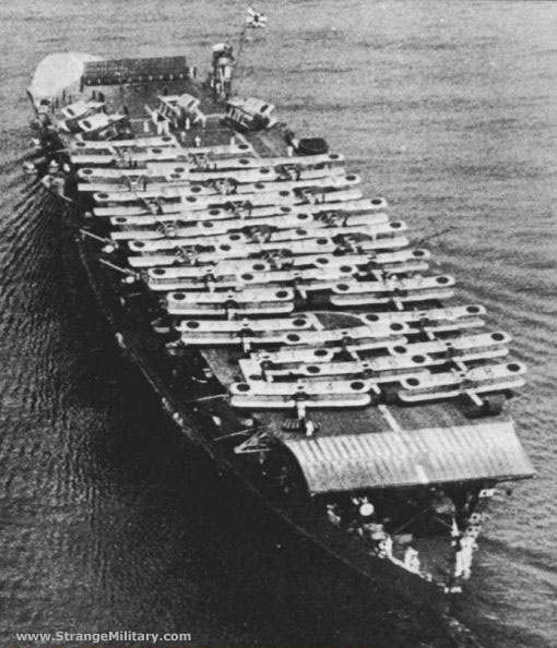 JAPANESE AIRCRAFT CARRIER - MANY BI-PLANES 