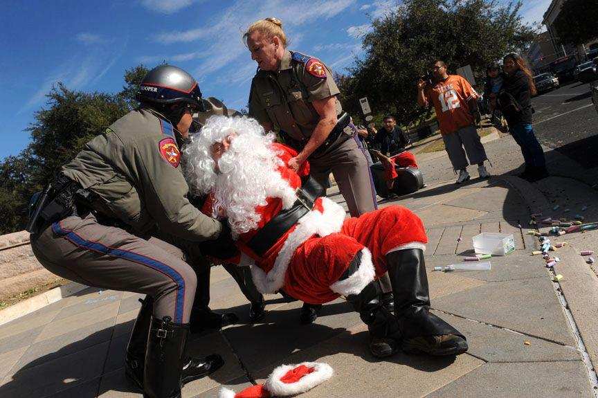 Austin, Texas. December 21, 2012. James Peterson, was arrested after spreading holiday cheer and chalk with young people in front of the Texas capitol building. After asking "Why am I being arrested?"Ã‚Â a female officer stated, "You're the only report that we got of chalking."