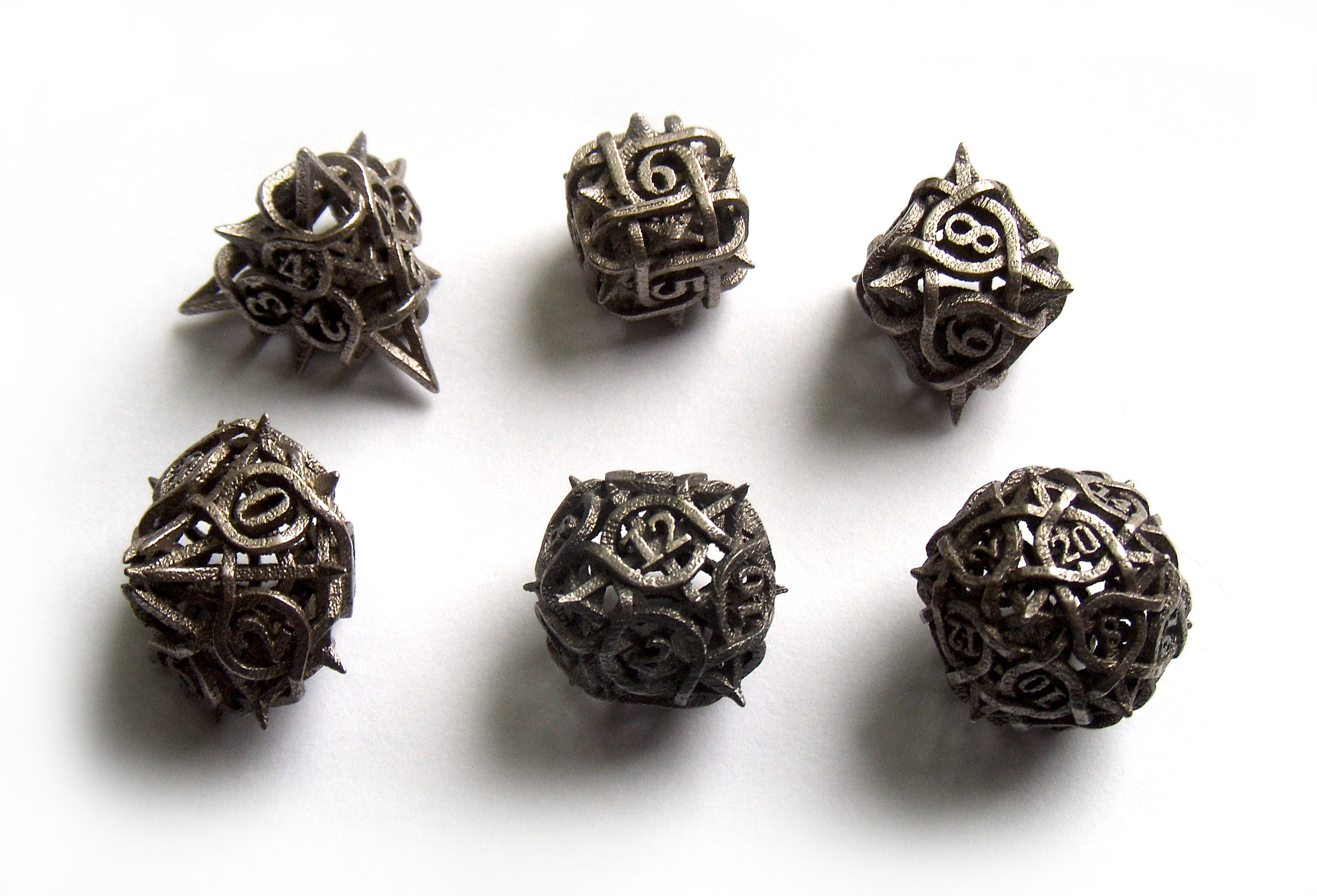 "Thorn Dice" Designed by Wombat, 3D printed by Shapeways.