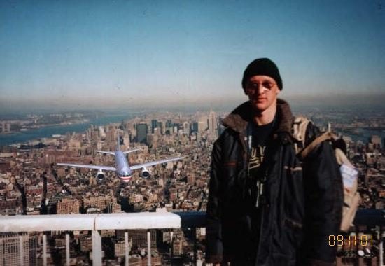 9-11 Tourist Guy. Soon after September 11, 2001, a sensational photo began circulating via email. It showed a tourist posing for a snapshot on top of the World Trade Center as a hijacked plane approached from behind. Apparently the photo had been taken just seconds before disaster struck.
