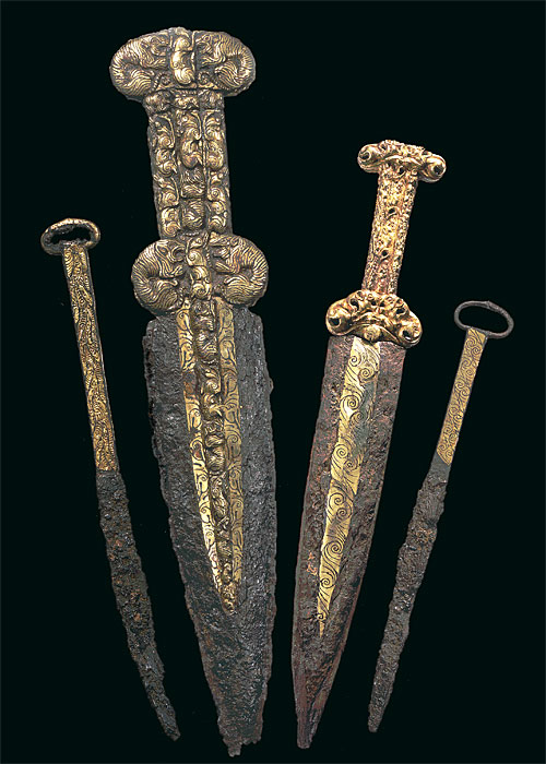 Scythian iron daggers and knives with gold plating. 6th-5th c. BC, from Arzhan - 2, Scythian royal necropolis in Tuva, Southern Siberia.