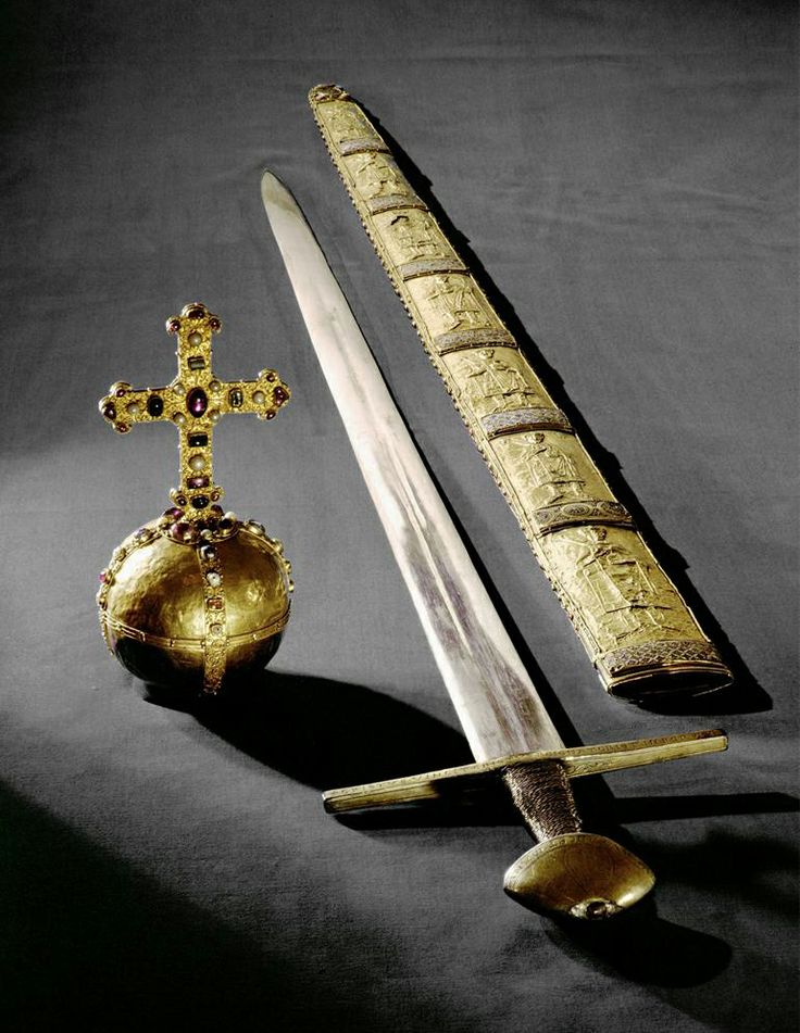 Imperial Orb, Sword and Scabbard of the Holy Roman Empire. The orb was made in Germany c.1200, the scabbard in Italy in the 2nd half of the 11th century, and the sword in Germany c.1198-1218. The gold panels on the scabbard depict kings and emperors from Charlemagne to Henry III.