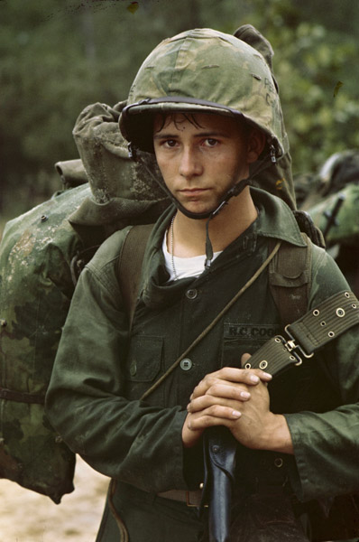 A young Marine Private waits on the beach during the Marine landing, August 3, 1965.