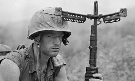 An American soldier after the capture of Hill 471, near the northern border of Khe Sanh, Vietnam, April 1968.