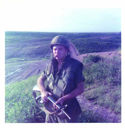 Specialist Denny Kirkham patrols the hilltops in Vietnam in 1970. Kirkham, only 18-years-old when drafted, earned a Bronze Star for his duties as a radio operator during the Battle of Fire Support Base Ripcord in the A. Shau Valley, the only battle lost by the 101st Airborne Division in Vietnam.
