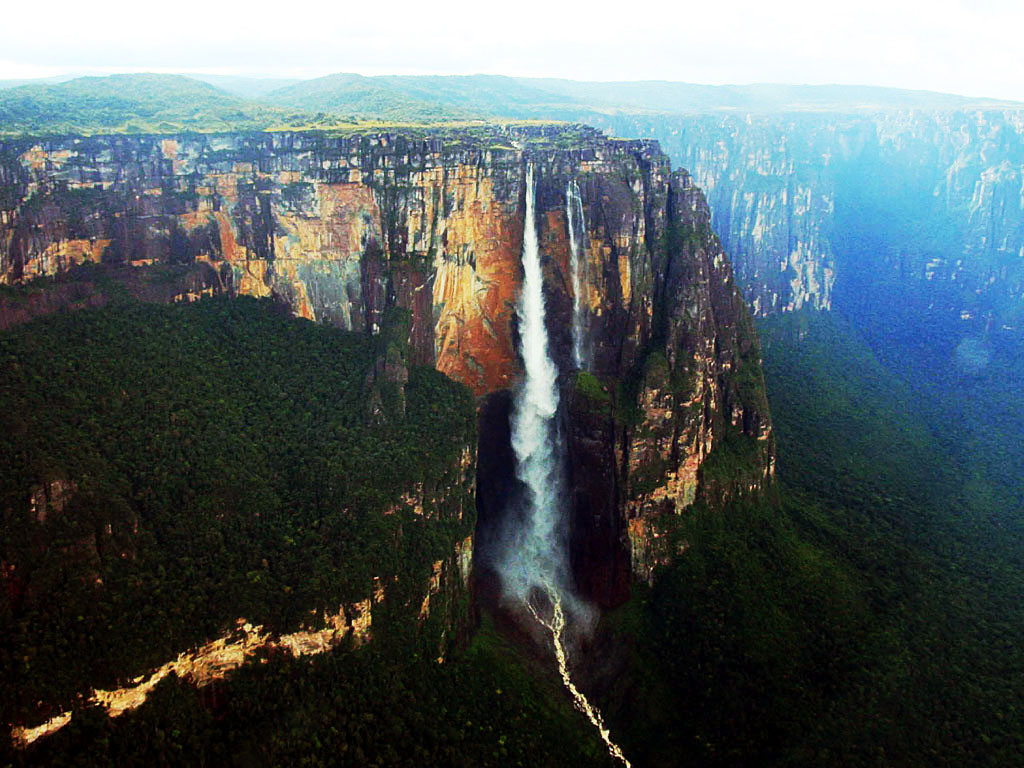 Venezuela’s Angel Falls, is the highest waterfall in the world. With a height of 979 m (3,212 ft), Angel Falls defines majesty. Its greatest single drop measures 807 m (2,648 ft), with other rapids and cascades combining to form the remaining height.