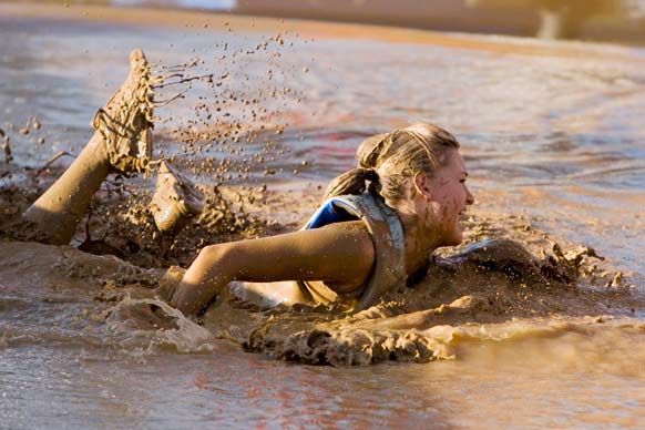 Shouldn't there be a second woman in that mud with her?