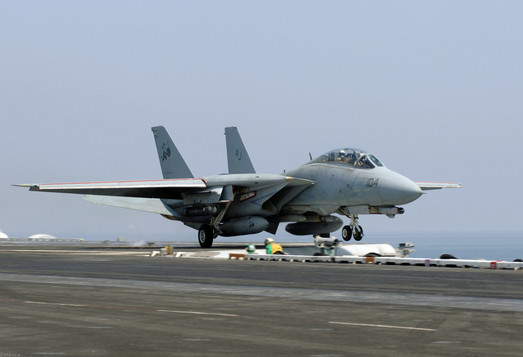 An F-14 leaving the flight deck of a carrier. The F-14 was the most maneuverable aircraft produced to date.