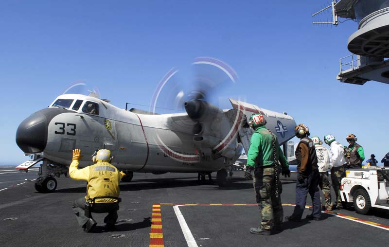 A C-2 CoD flight preparing to depart. CoDs carry mail, other supplies, and personnel to and from the ship.