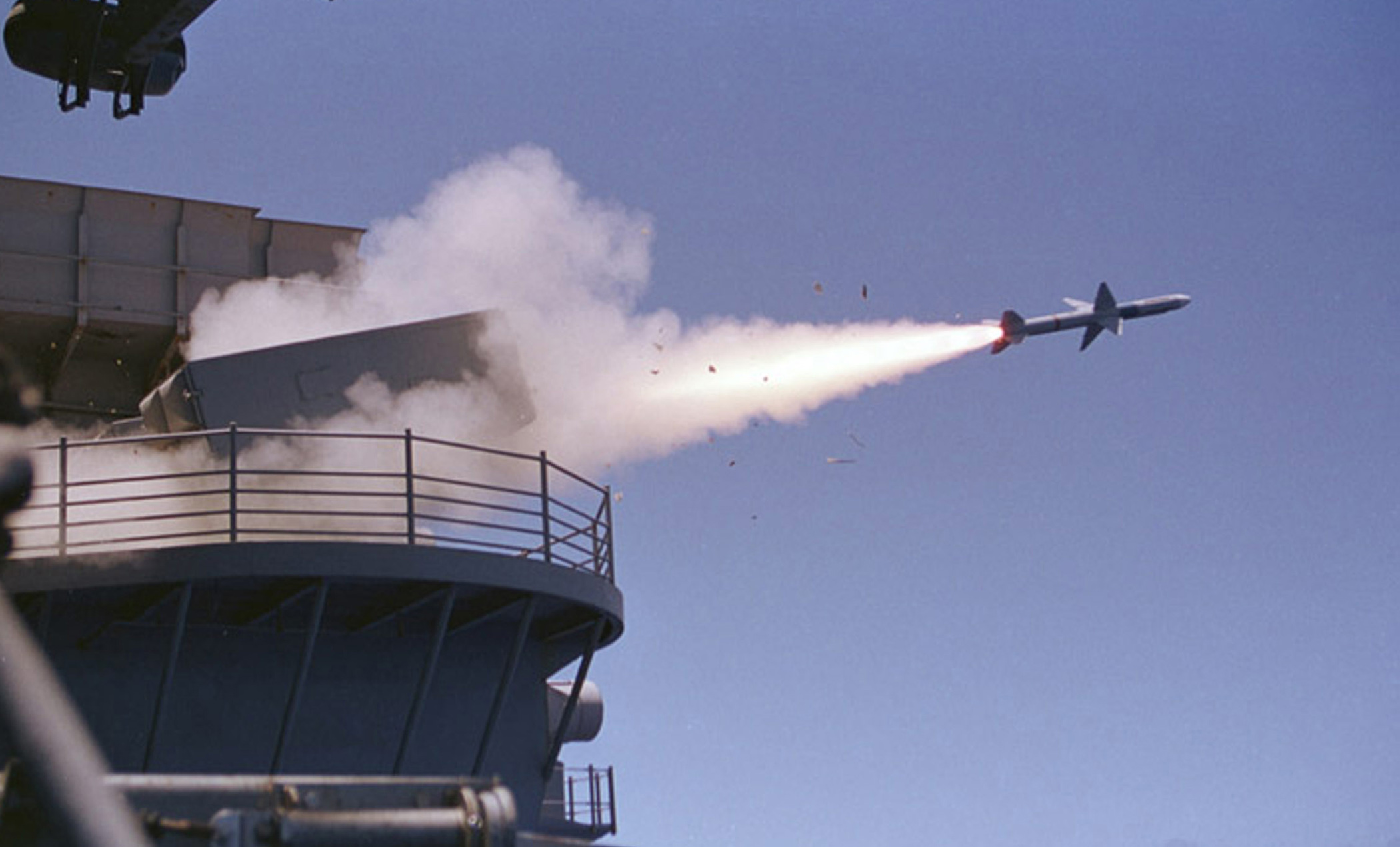 The Kitty Hawk fires off a Sea Sparrow Anti-Air missile.