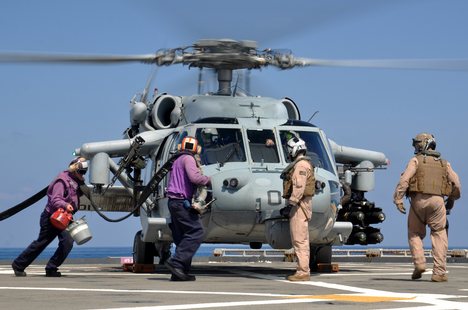 An SH-60 Seahawk helicopter refuels before it's next flight.