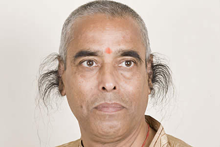 Radhakant Baijpai World's Longest Ear Hair --almost than 10 inches long