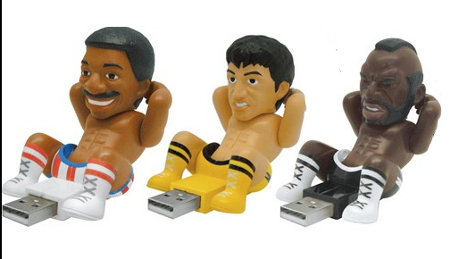 Looking to add a little homoerotic flair to your computer? How about the characters from Rocky III performing sit ups in a USB port? Available in Apollo Creed, Rocky and Clubber Lang who's making the best face varieties, the 30 port-humpin' fools