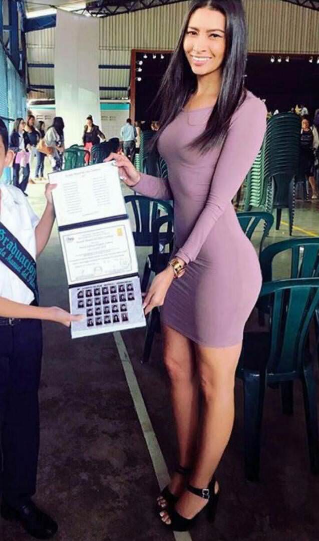 Photo taken by a proud father-of his son receiving his diploma from his teacher.....