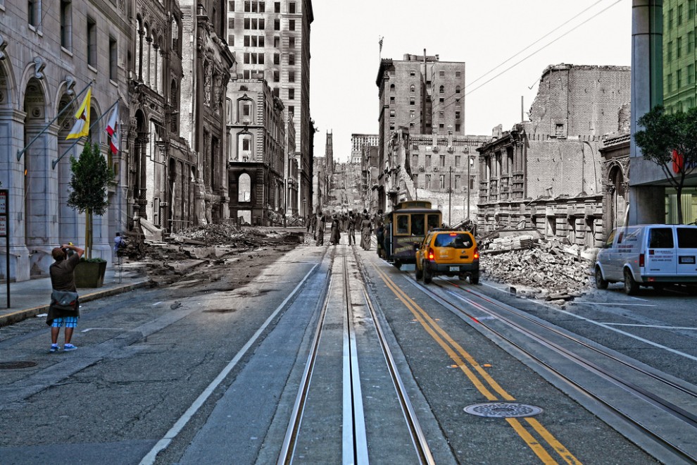 A cable car heads towards the California St incline while shocked residents walk aimlessly through street amidst the devastation.	