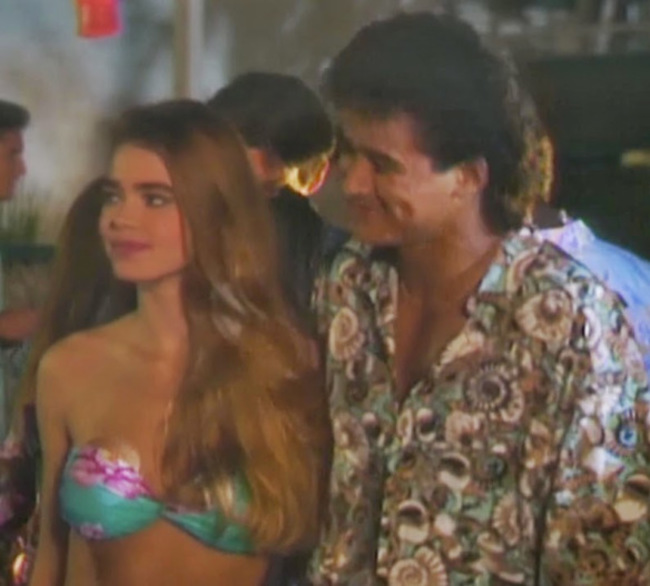 The girl that Slater rescues when she pretends to drown during the last Malibu Sands episode is actually Denise Richards.