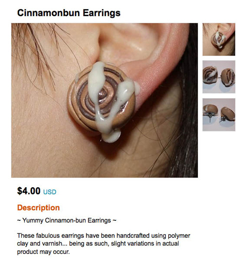 Earrings of a cinnamon bun with cringeworthy frosting plastic.