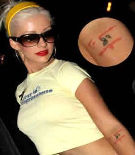 Christina Aguilera wanted to have Jordan Bratman's initials, she has "12" instead.