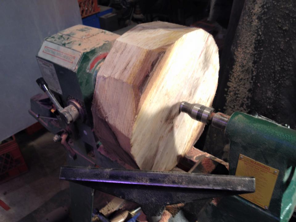 That big block of wet wood is heavy! Bring your tailstock up to steady the piece until you have it balanced. A 10lb chuck of wood, flying off at 750RPMs will hurt. Make sure it's on there good.