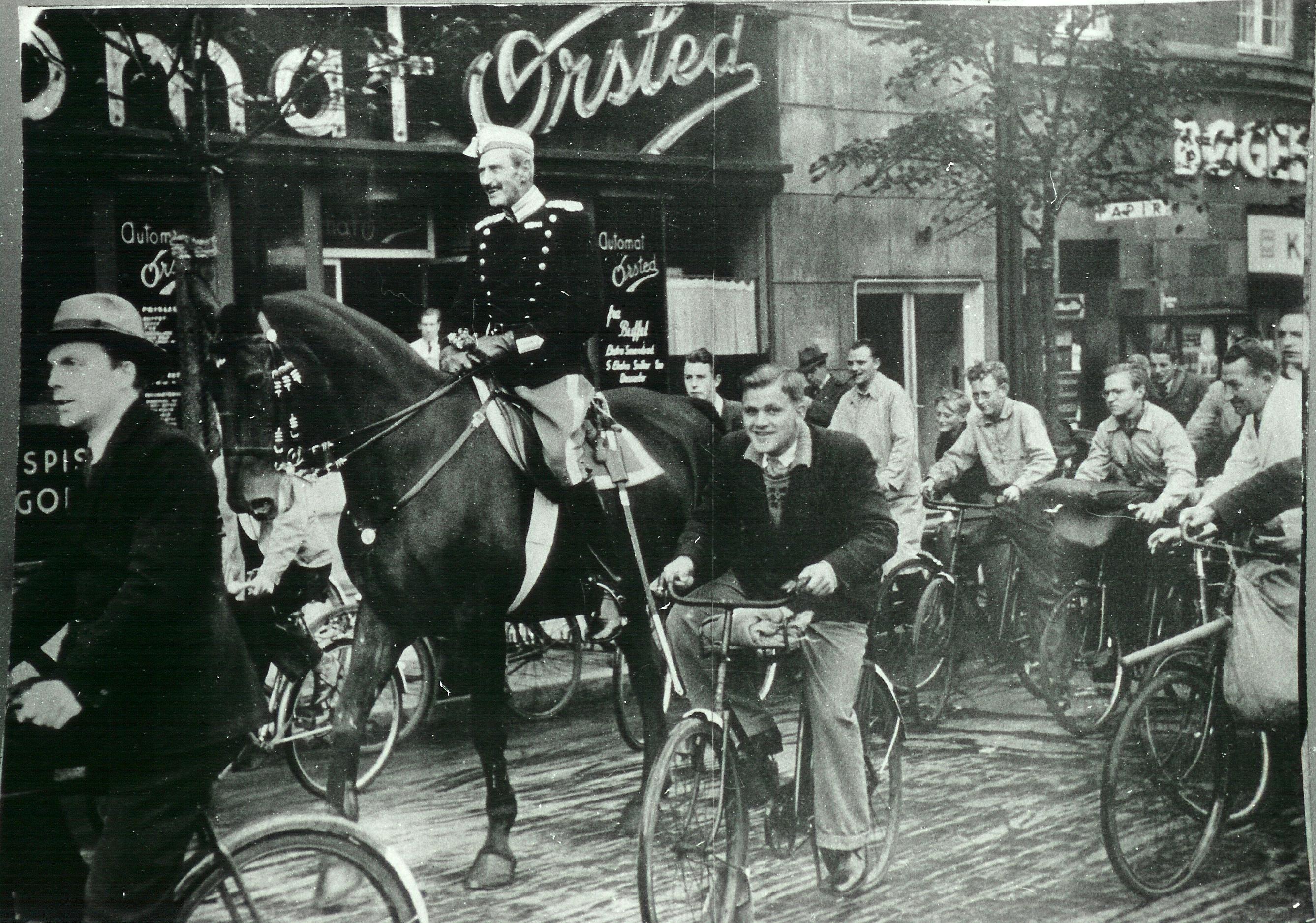 King Christian X of Denmark enjoying a bike ride after having hypnotized his horse into thinking it is a bicycle (1940).