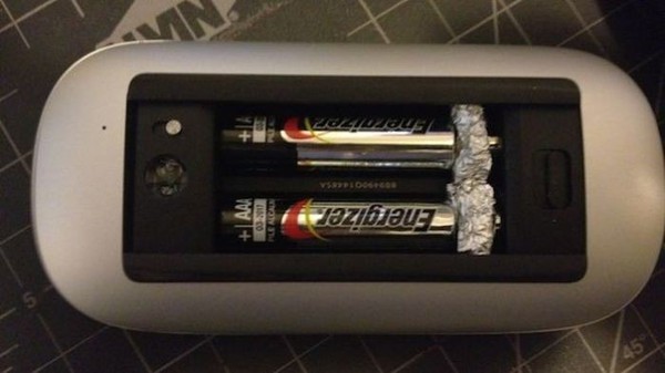 If your batteries are too short fill the gap with aluminum foil to sent the charge through it without problems.