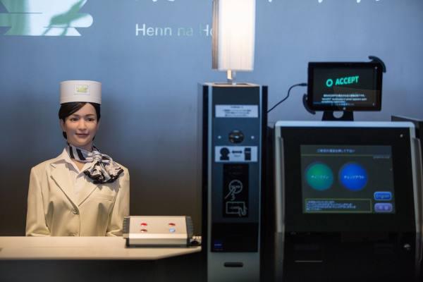 The owner Hideo Sawada claims the lack of humans increases productivity. This is the receptionist...