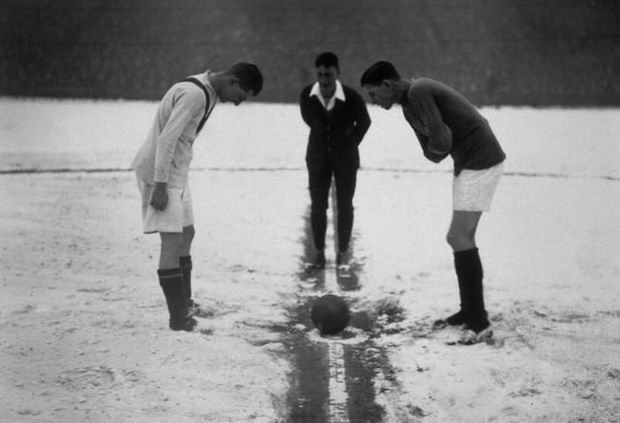 Referee and two players look whose d*ck shrank the most on the cold and wonder why they're playing in effing shorts, London 1926.