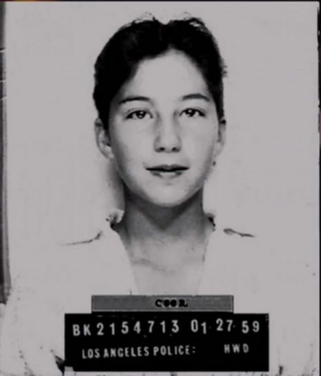 Young Cher arrested for stealing a car, smiling cause the cops still haven't found out she took a dump on the backseat of their patrol car, 1959.