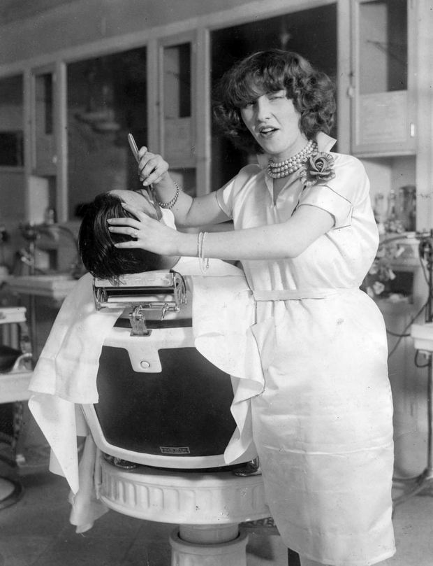 First female barber trying to win a bet that she can shave a man while being totally drunk without cutting his throat. She almost won, 1927.