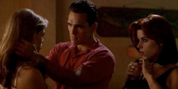 Neve Campbell, Denise Richards and Matt Dillon, Wild Things (1998).
The movie is famous for the love scenes, the threesome between Campbell, Richards and Dillon being one of these. You cn copy the text from the first pic "Both girls were stressed before the love scene so they chugged down a whole bottle of tequila", seems tequila is the drink of love.