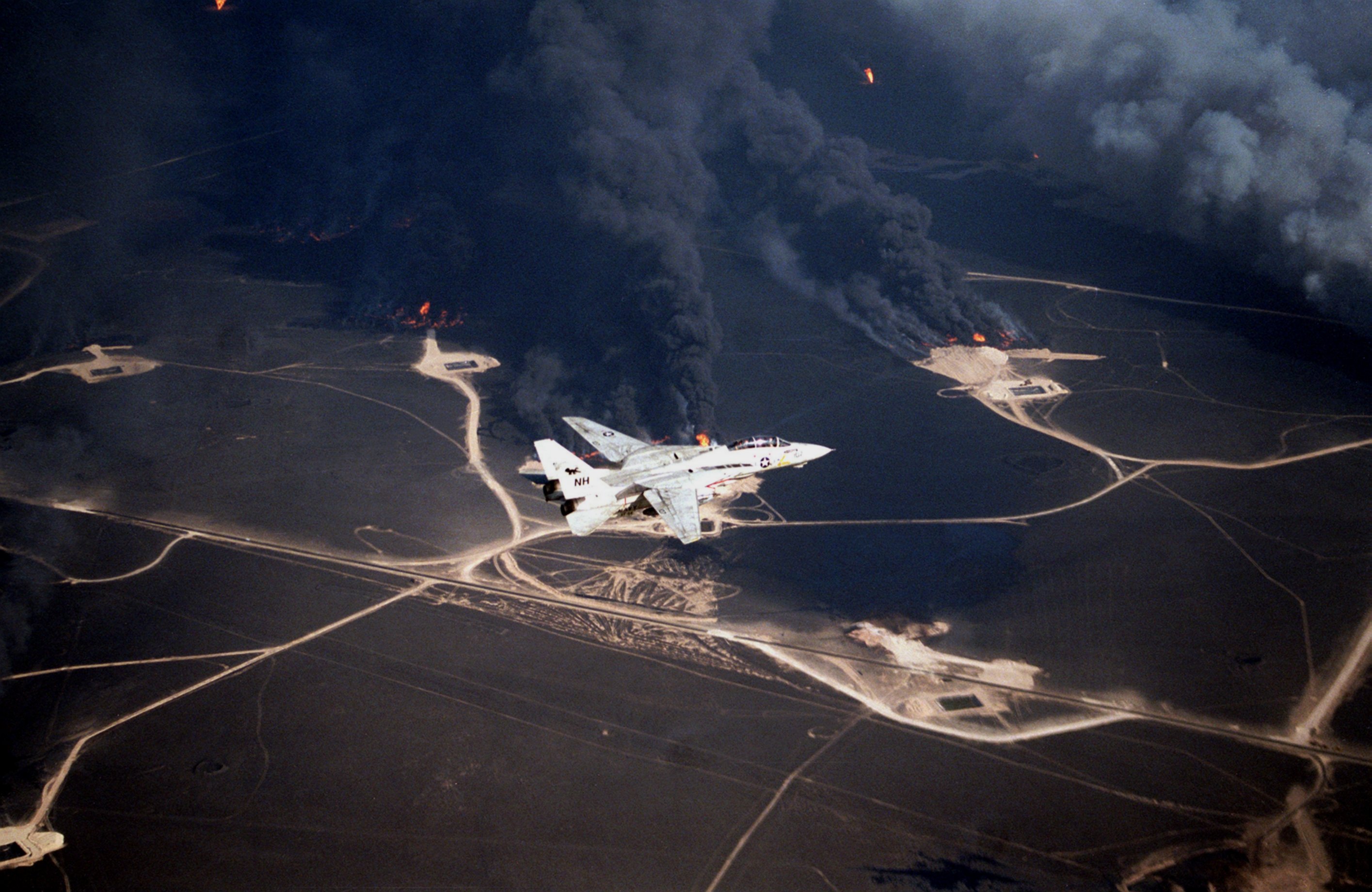 VF114 flying over burning oil wells in Kuwait during the Gulf War, 1991.