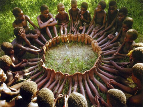 african children sitting in a circle