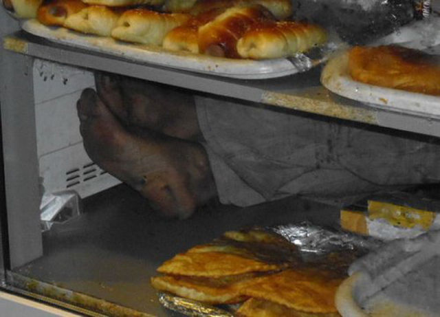 person sleeping in bakery