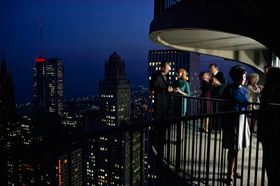 The Chicago skyline is a backdrop for rooftop partygoers, 1967.