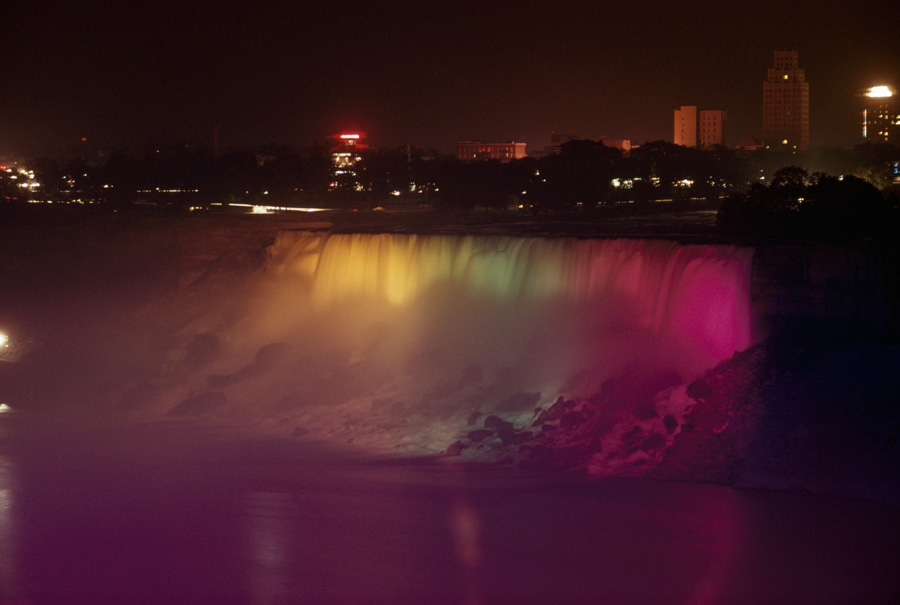Niagara Falls illuminated with rainbow flood lights, 1956.
