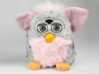 Furbies are furry toys with large eyes and ears that repeat whatever someone says to them. They first appeared in the US in 1998 and were an instant hit. The National Security Agency banned them from its Maryland office because they feared that they were being used to spy on the agency. They also feared that since Furbies repeated what they heard, they could expose government secrets when their owners took them home by simply repeating what they heard at work.