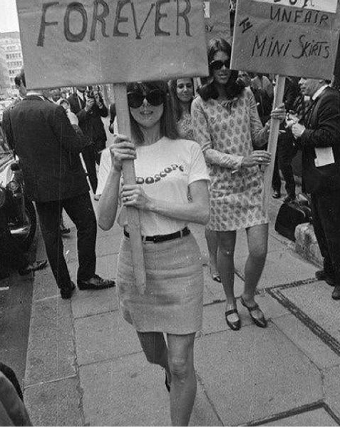 60s London girls protesting for mini skirts.