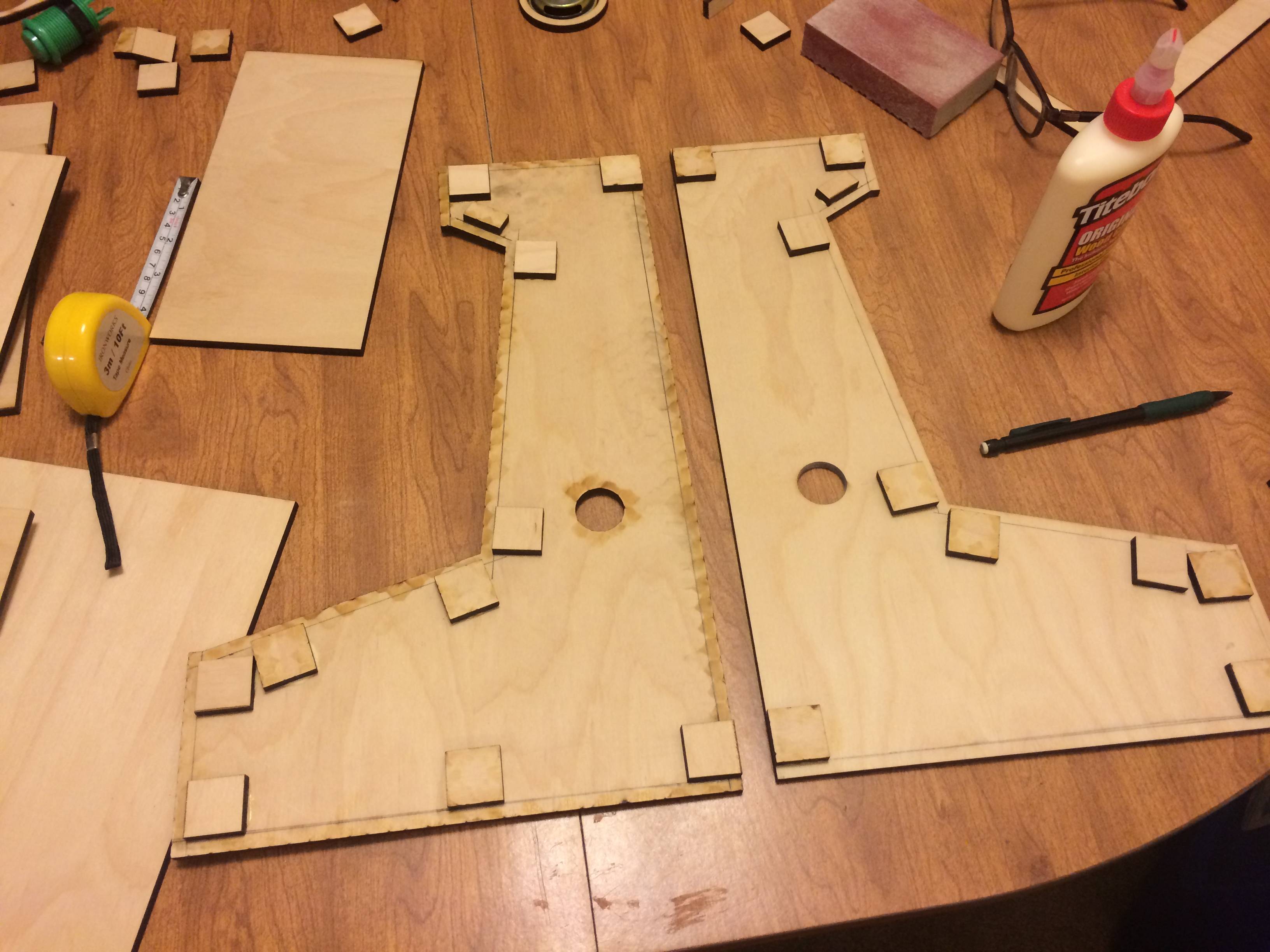 Here is how I made sure all the panels would sit flush. I had a bunch of 1X1 squares cut and used them as supports. When placing them down I had another piece of wood so that they would be exactly ¼ inch away from the edge. Ended up working perfect as all my joints are freaking sweeeet.