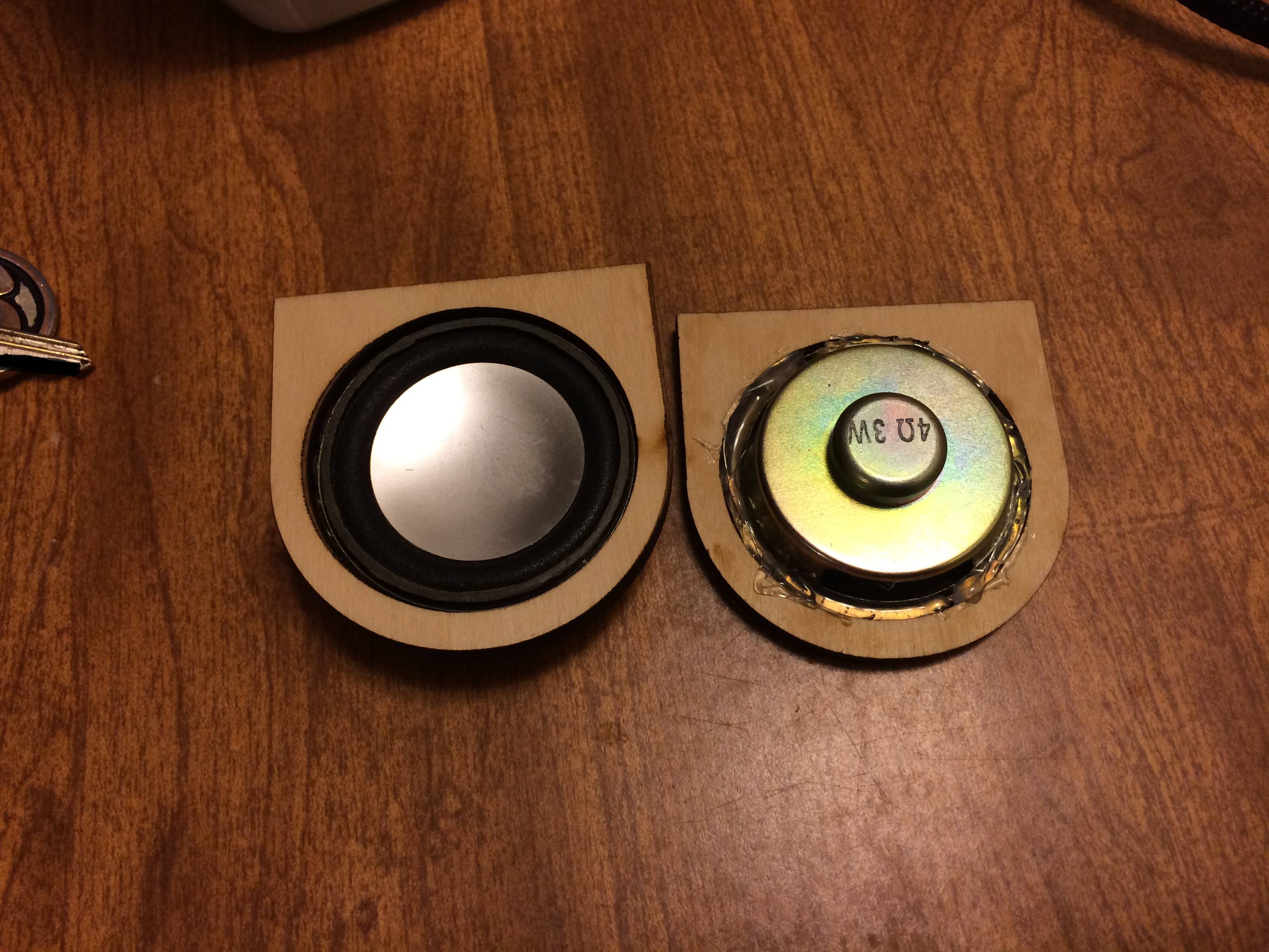 Here are the little circle things I had laser cut, and then hot glued the speakers into.