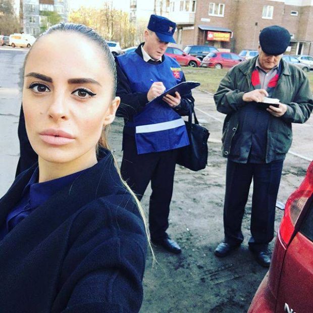 Russian Official Gets Fired When Pictures Of Her "Other Job" Surfaces