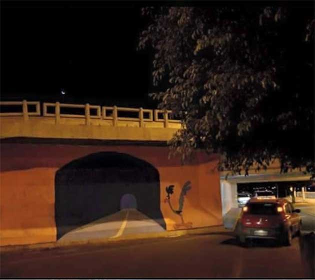 These photos have been making the rounds. But many are questioning the authenticity of the story. Apparently someone thought it would be cool to paint a scene from the Roadrunner onto the side of a wall, on the road. They thought it was harmless until...