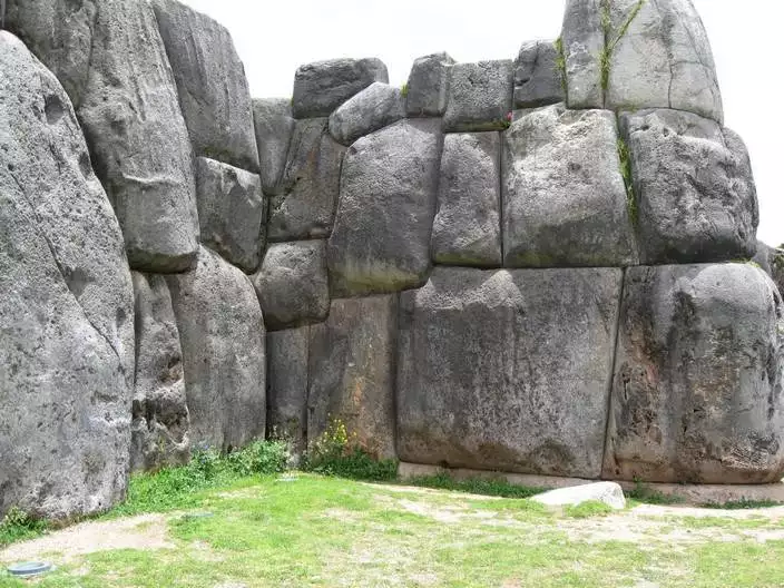 Saksaywaman. These stacked stones and boulders sit outside Peru, and fit together so well without mortar that it's impossible to get anything between two of the stones.