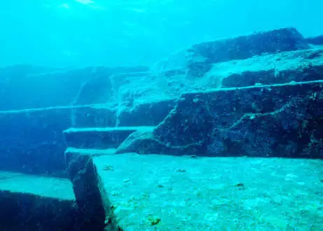 Yonaguni Monument. There is still debate on whether this huge underwater structure was man-made or somehow natural forming. It sits off the coast of Yonaguni, Japan and contains flat edges as well as 90 degree angles.