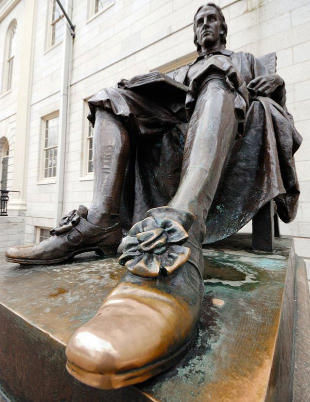 Harvard's Left Shoe. John Harvard gave money to the University of Harvard in 1641, five years after it came to life as a College. Rubbing the left shoe of the statue he was granted in gratitude on Campus was supposed to give students good luck and good grades, but now tourists also rub the shoe as you can see it turned kinda yellow. We inform you should not even touch the shoe because the yellow color is partly caused by bad students that are so pissed off they take it out on John Harvard himself by... pissing on his left shoe. Ewww.