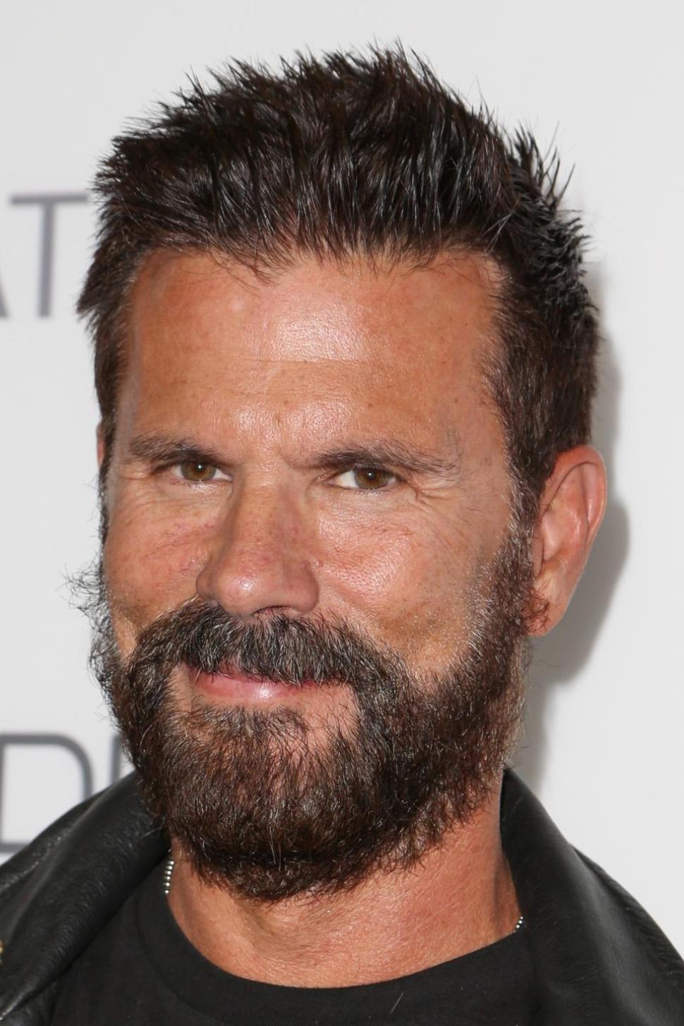 Lorenzo Lamas looks like he was using a landscaper rather than a hairdresser.