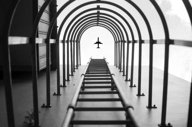 When Chay Yu Wei won a competition for a great amateur photo  held by Nikon people were impressed. He said he saw these steps in China Town and took a pic not knowing about that a plane will be flying there.