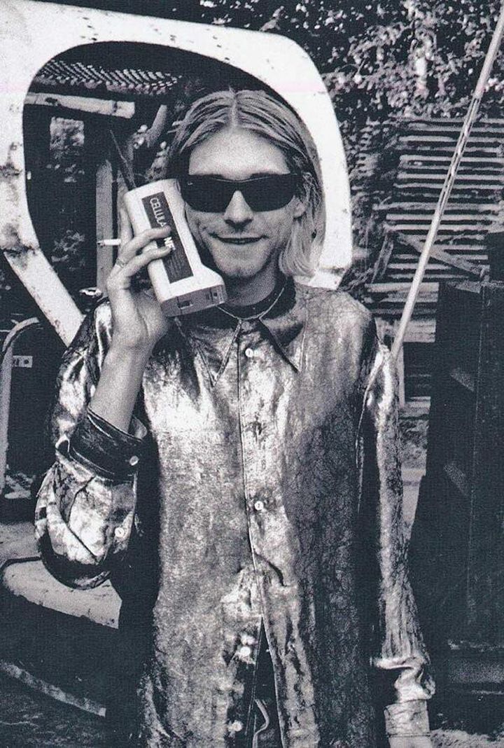 Kurt Cobain talking on his cellphone in the 1980s.